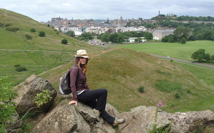 Prof. Watts sitting on stones in Scotland